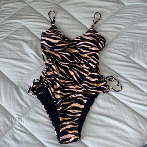 Very sexy one piece with side cut outs